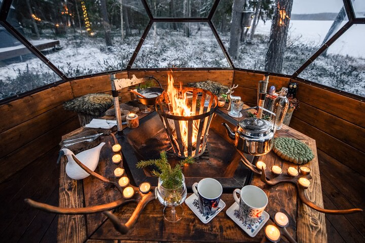 Dinner in a Glass Igloo Under Northern Lights