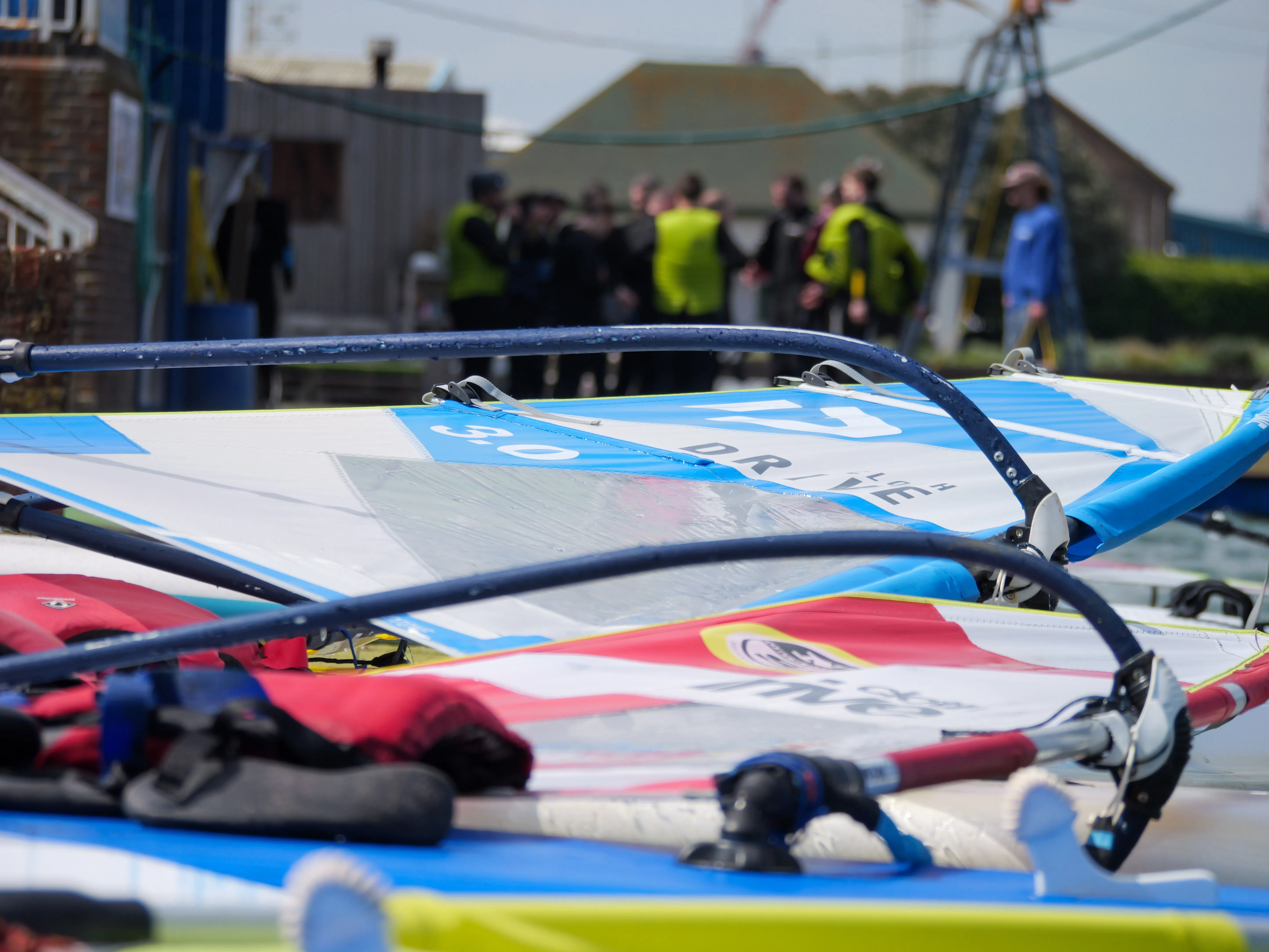 Catch the wind and speed across the water in a introductory windsurfing session